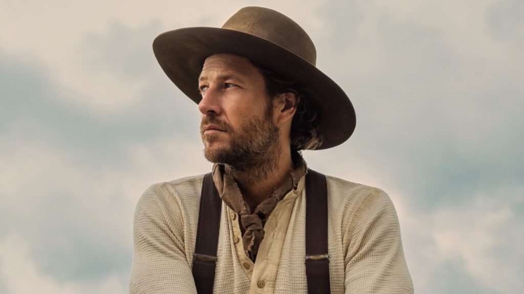 Little House on the Prairie. Luke Bracey as Charles Ingalls in episode 101 of Little House on the Prairie. Cr. Eric Zachanowich/Netflix © 2026