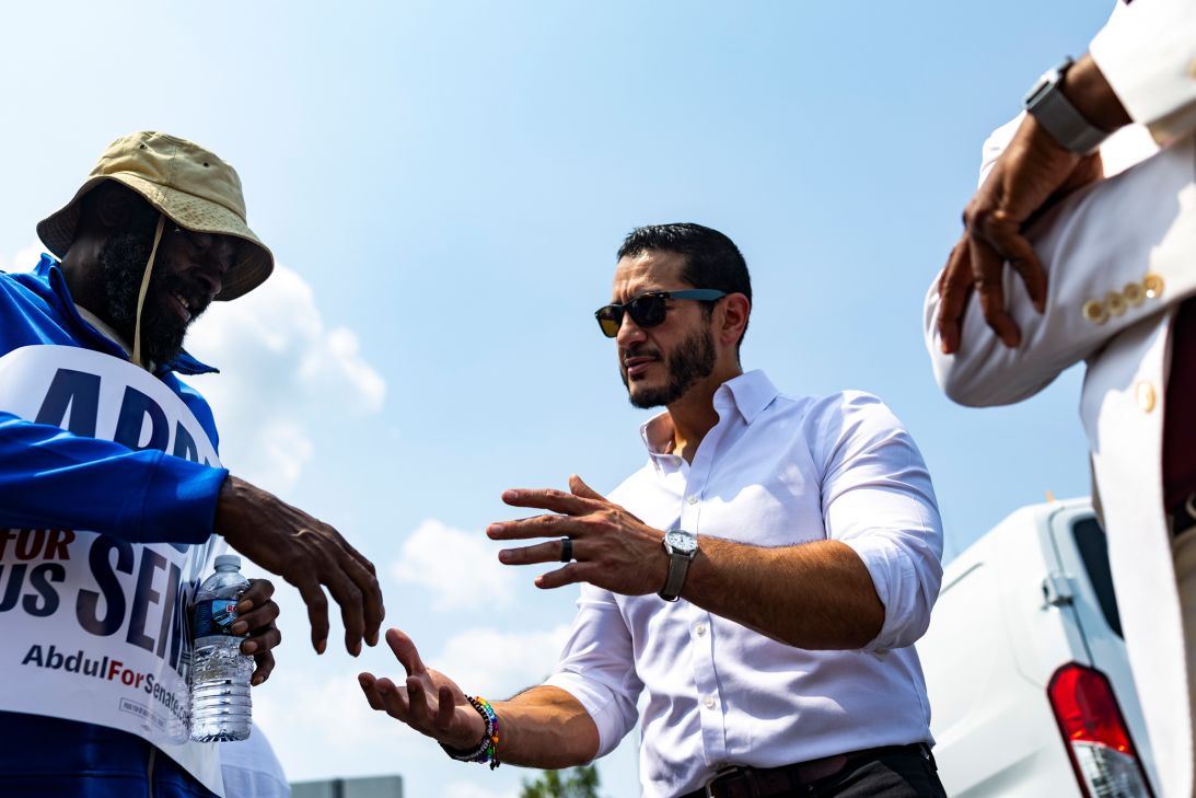 El-Sayed converses with voters during 