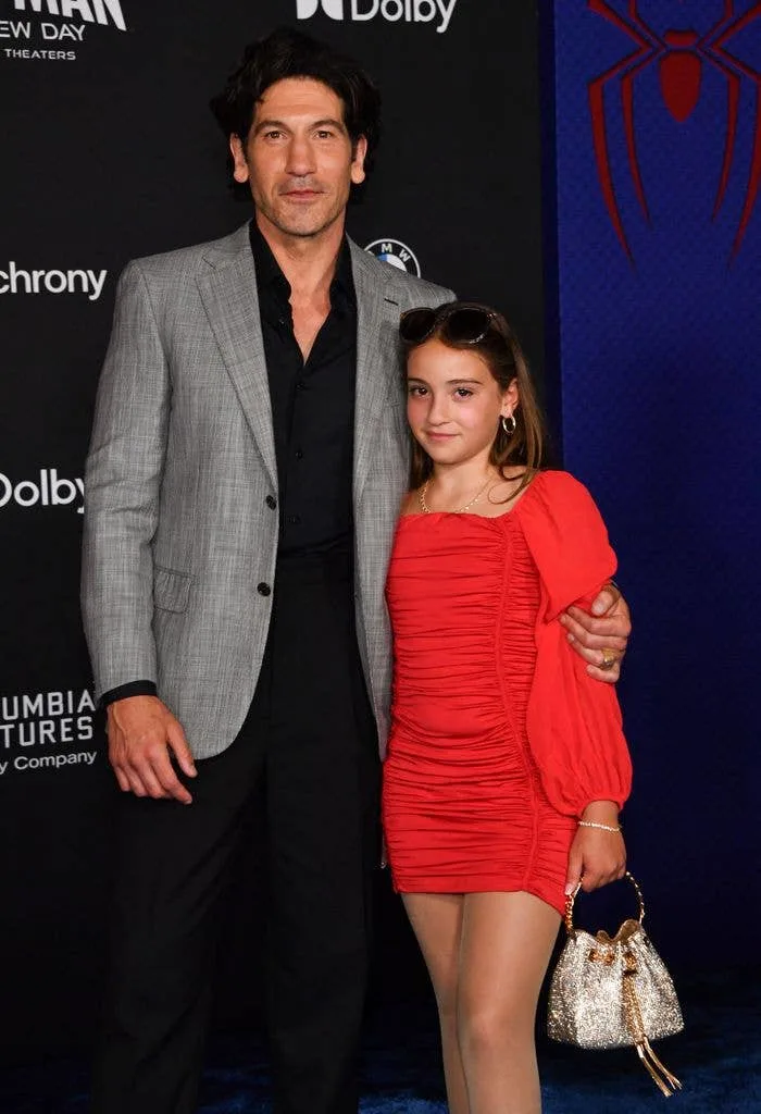 Jon Bernthal with his arm around his daughter Adeline at an event