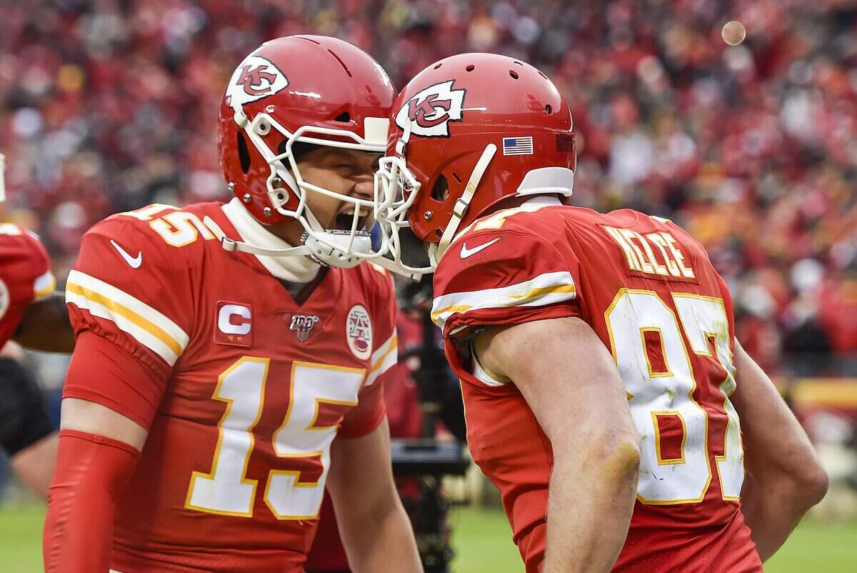 Kansas City Chiefs quarterback Patrick Mahomes and tight end Travis Kelce celebrated after Kelce scored a second touchdown in the second quarter against the Houston Texans on Sunday, January 12, 2020, at Arrowhead Stadium in Kansas City.