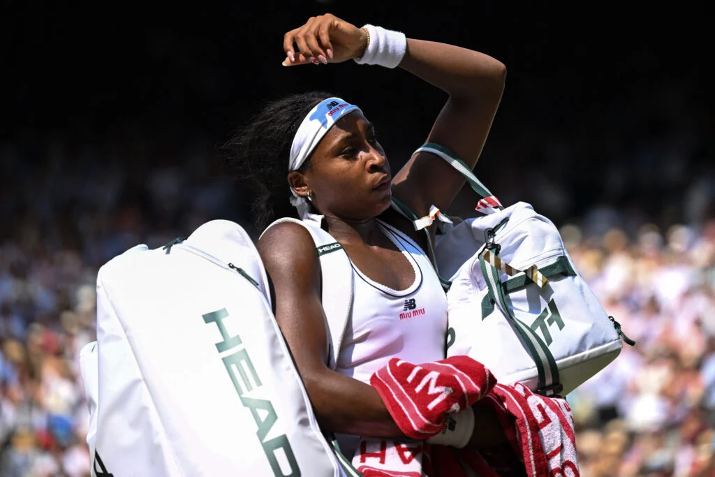 Coco Gauff leaves the court after losing to Karolina Muchova at Wimbledon.