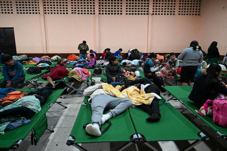 Evacuees rest at a shelter after fleeing their village following the eruption of Fuego volcano in Alotenango, Guatemala, early on Tuesday.