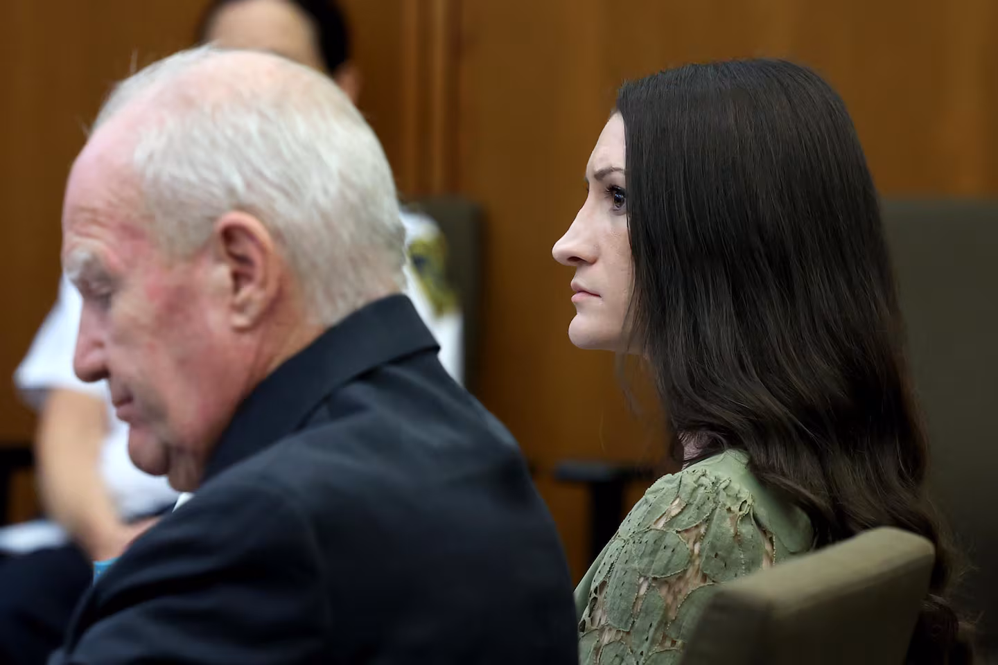 Defense attorney Kevin Reddington, left, and his client, Lindsay Clancy right, listen to testimony during Clancy's murder trial at Plymouth Superior Court in Plymouth, Mass., Wednesday, Aug. 12, 2026.