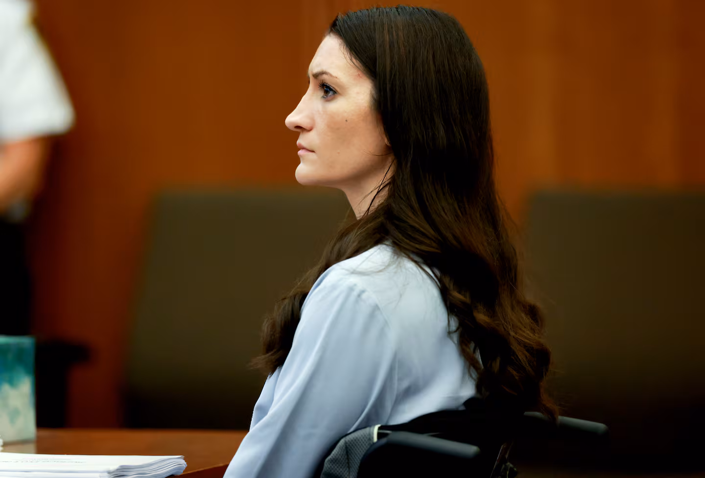 Lindsay Clancy, listens, to Judge William F. Sullivan addressing the court at her murder trial.