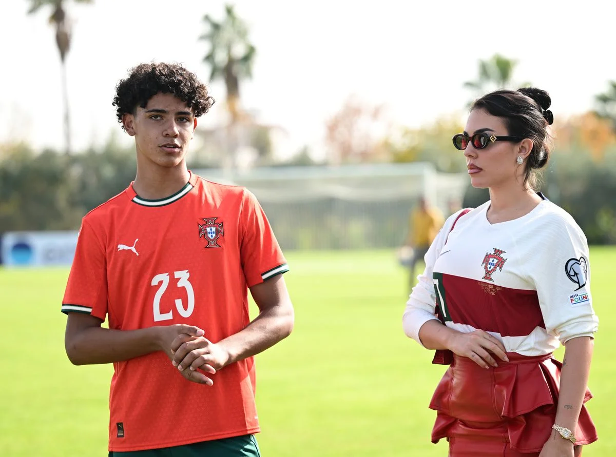 Ronaldo's son Cristiano Dos Santos (23) talks with Cristiano Ronaldo's fiance Georgina Rodriguez after the U-16 preparatory tournament match between Portugal and England national football teams in Antalya, Turkiye on November 4, 2025. (Photo by Orhan Cicek/Anadolu via Getty Images)