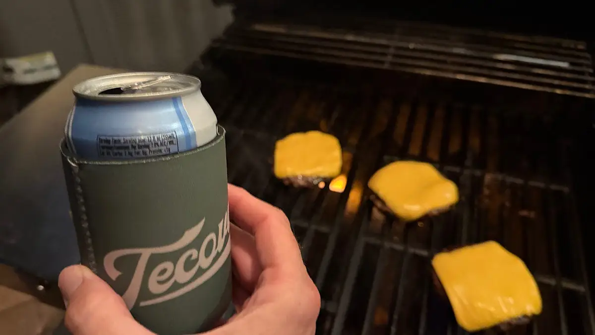 Screencaps reader Gen X Warren M checks in with cheeseburgers on the grill.