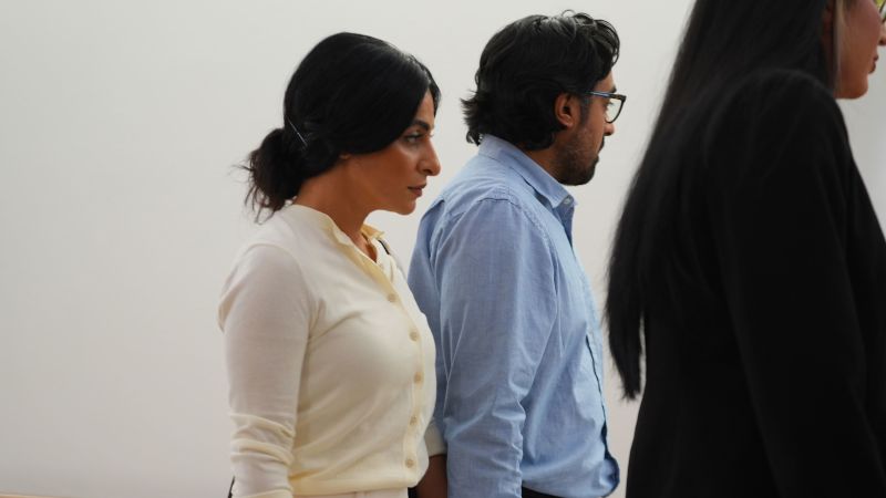 California couple confront their surrogate in a Texas court as dispute over newborn escalates
