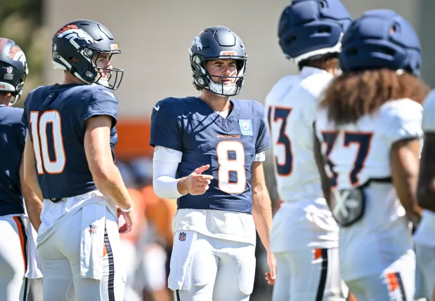 Bo Nix (10) and Jarrett Stidham (8) of the Denver Broncos work with receivers during training camp at Broncos Park in Centennial, Colorado on Wednesday, August 19, 2026. (Photo by AAron Ontiveroz/The Denver Post)