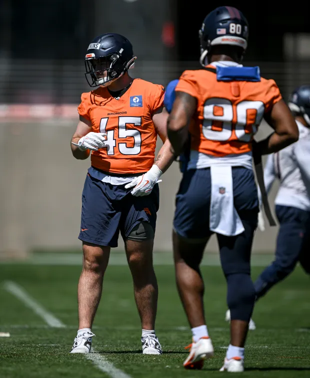 Nate Adkins (45) and Justin Joly (80) of the Denver Broncos work out during OTAs at the Broncos Park in Centennial, Colorado on Thursday, June 4, 2026. (Photo by AAron Ontiveroz/The Denver Post)