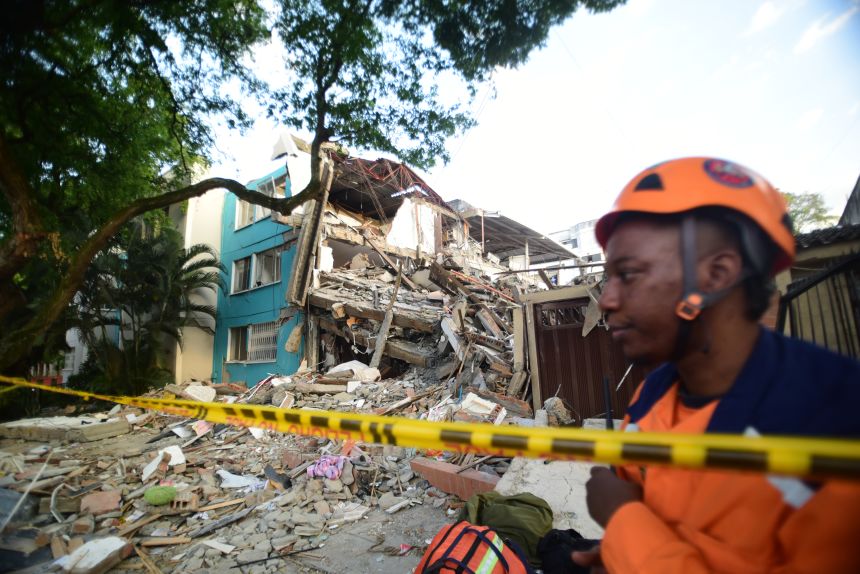 Members of rescue organizations continue search operations following the earthquake that struck the city of Cali, Colombia, on August 11.