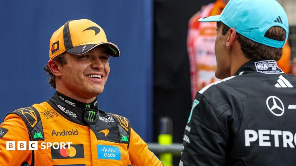 Lando Norris chats to George Russell after qualifying