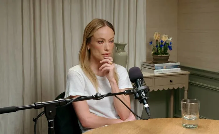 Olivia speaking in an interview