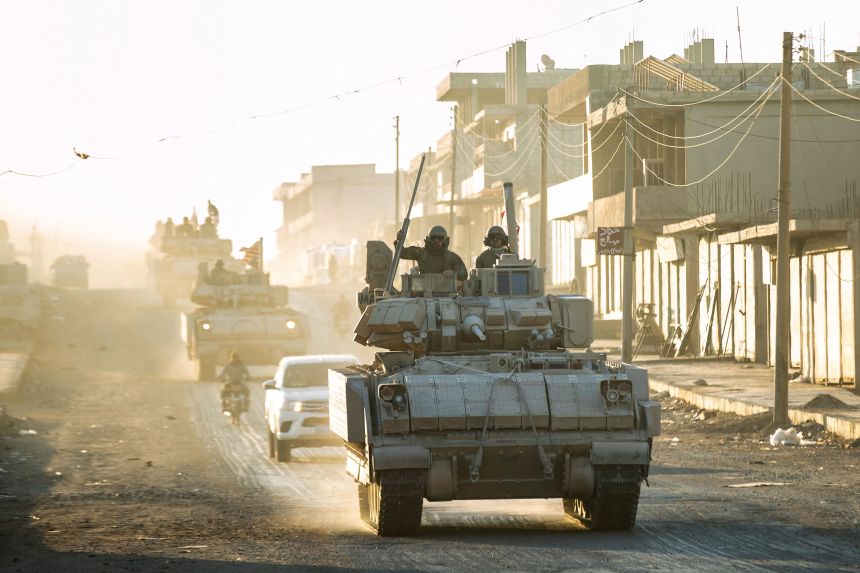 US forces patrol oil fields near Syria's northeastern border with Turkey in the Qahtaniyah countryside in the far northeast corner of Hasakeh province on September 3, 2024.