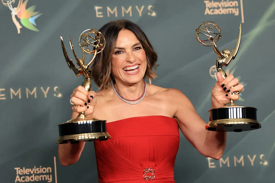 Mariska Hargitay poses with the Emmys she won for her HBO documentary, 