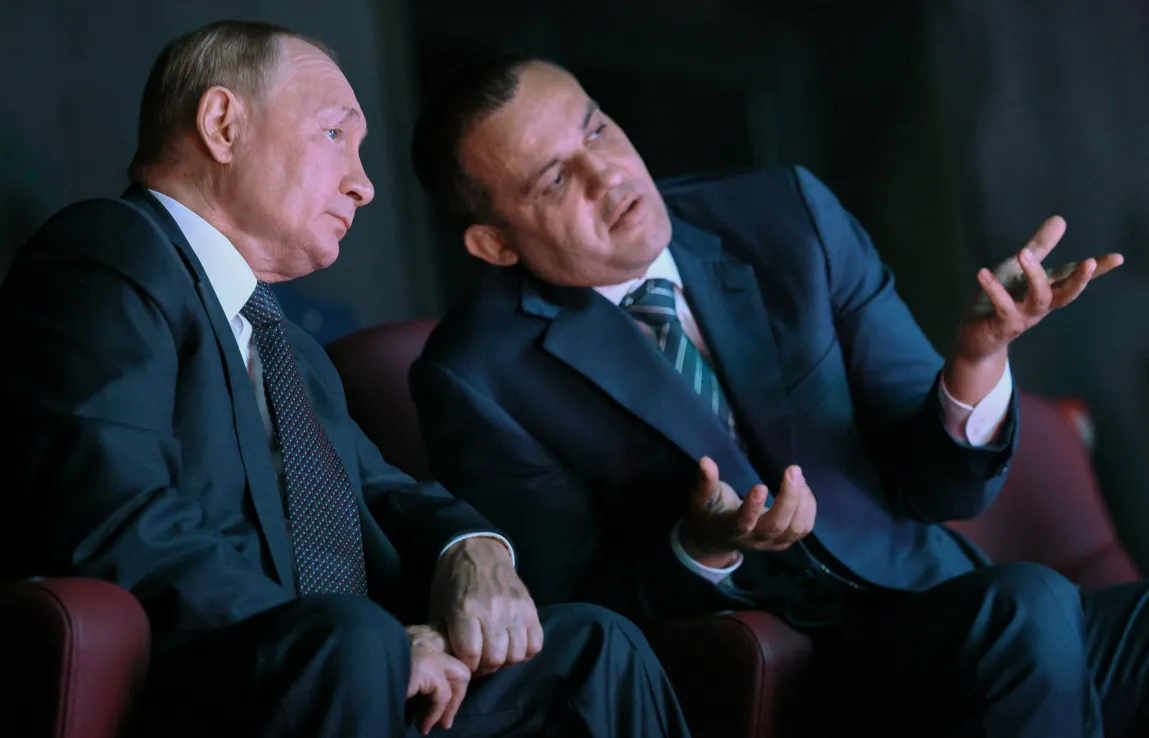 Russian President Vladimir Putin leans into a conversation with Umar Kremlev.