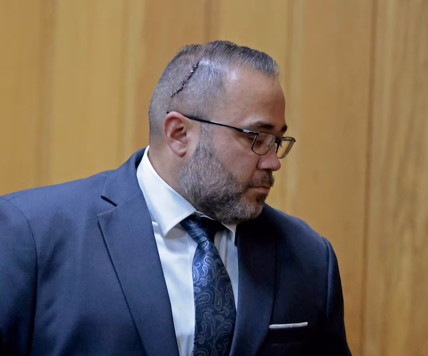 GOP lieutenant governor nominee Shawn Oliver entered the courtroom in New Bedford on Monday with a noticeable injury to his head.
