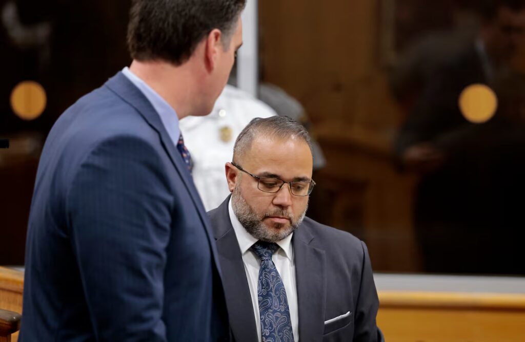 GOP lieutenant governor nominee Shawn Oliver, right, turns to leave a New Bedford courtroom after his arraignment Monday. He pleaded not guilty to drunken driving and other charges.