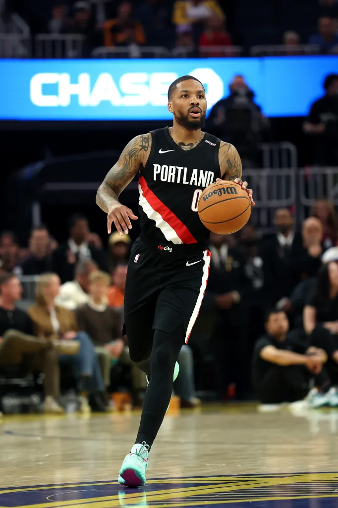 Damian Lillard brings the ball up the court.