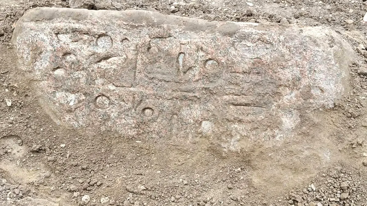 Ancient egyptian carvings on stone during excavation